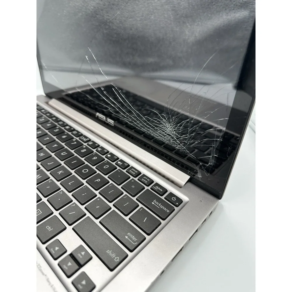 ASUS ZenBook UX303U Laptop FOR PARTS Cracked Screen Untested No Charger